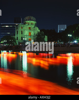 Floating lanterns on August 6th, Hiroshima, Japan. Placed in the river beside the A-Bomb Dome ( a UNESCO World Heritage Site. ) Stock Photo