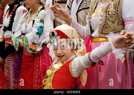 Kosovan girl in colorful traditional dress in a festival in Prishtine Kosovo Stock Photo