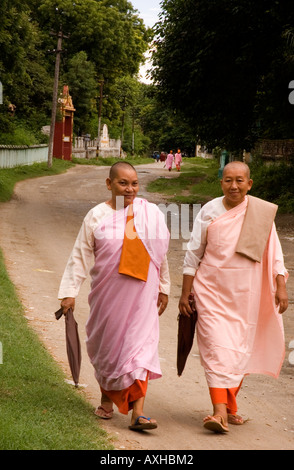 Stock photograph of two older nuns enjoying a walk at Sagaing Hill near Mandalay in Myanmar 2006 Stock Photo
