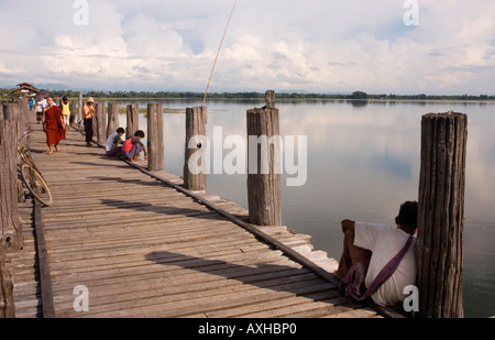 Stock photograph of the U Bein old teak bridge across Taungthaman Lake ...
