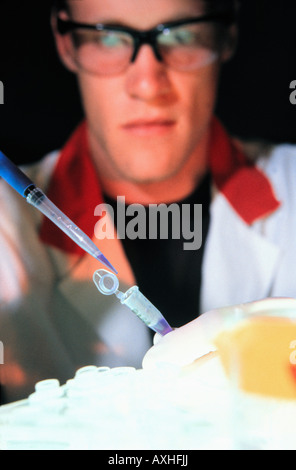 researcher extracting DNA from sample Stock Photo