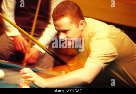 Two men playing billiards. Stock Photo