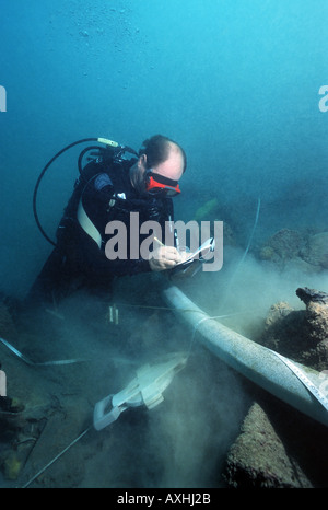 scubadiver in an underwater archeological site Stock Photo
