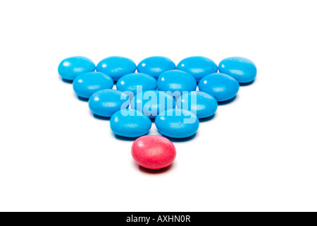 Coloured candy used to show the concept of leadership or gender Stock Photo