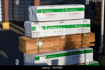 Western red cedar timber packed ready for shipping from a sawmill Chamainus Vancouver island Canada Stock Photo