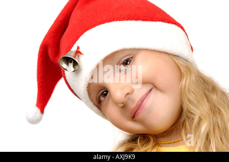 Smiling little girl in christmas hat Stock Photo
