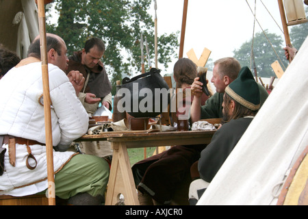 Soldiers feasting at the re-enactment of the battle of Hastings in England 2006. Stock Photo