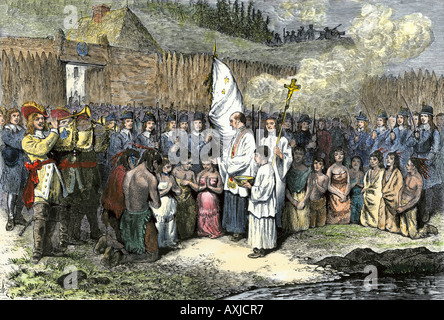 French priest baptising Indians at Annapolis Royal now Nova Scotia 1600s. Hand-colored woodcut Stock Photo