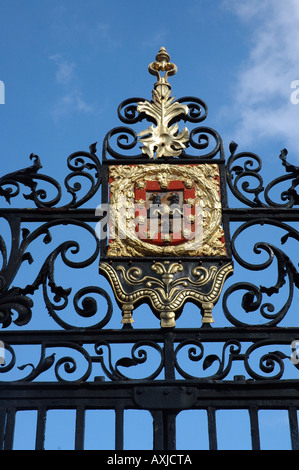 Jesus College in Cambridge, UK, gate with The College arms