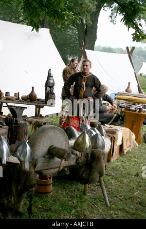 Armour helmets swords and animal skins for sale at the re-enactment of the battle of Hastings in 2006 Stock Photo