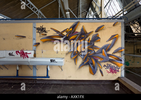 Graffiti in the changing-room of a factory, at Vichy (France). Graffiti dans le vestiaire d'une usine désaffectée (France). Stock Photo