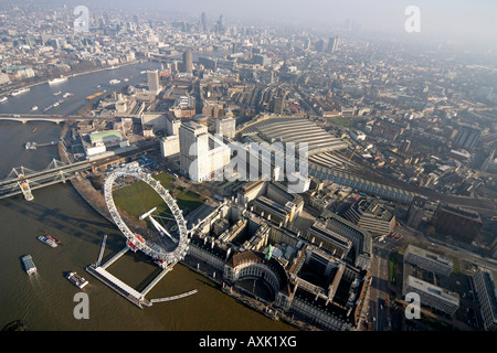 High level oblique aerial view south east of London Eye Waterloo Station Shell Building London SE1 England UK January 2006 Stock Photo