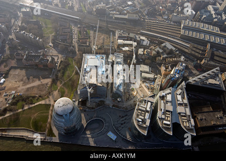 High level oblique aerial view south of City Hall and More London building construction site London SE1 England UK January 2006 Stock Photo