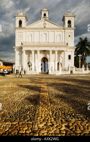 Catholic Church on cobblestone village square Parque Centenario Suchitoto El Salvador Stock Photo