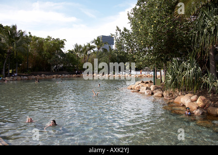 People swimming in pool by artificial Streets beach on South Bank in Brisbane Queensland QLD Australia Stock Photo