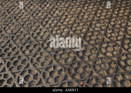 Pavement of cast iron tiles in Kronshtadt, Russia. Stock Photo