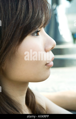 Young woman looking away, portrait, profile Stock Photo