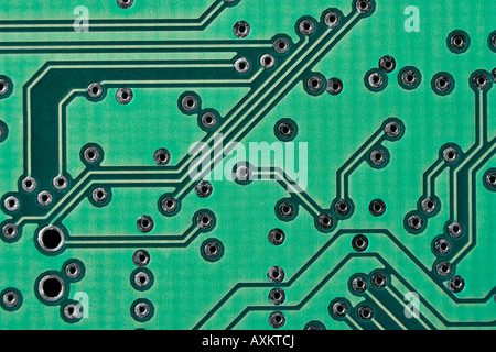 Underside of an integrated circuit board showing the etched connections between components Stock Photo