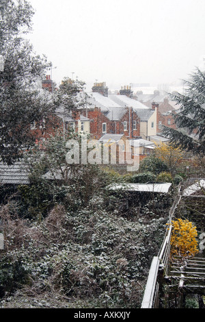 Backs of City Terraced houses in Winter Snow Stock Photo