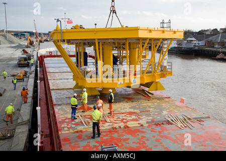 Rig platform being loaded onto container ship at Yarmouth Stock Photo ...