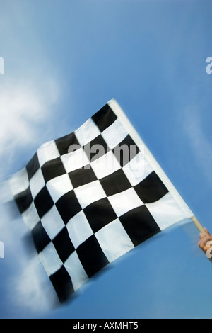 Hand waving checkered flag Stock Photo