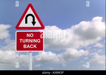 Signpost with No Turning Back against a blue cloudy sky business concept image Stock Photo