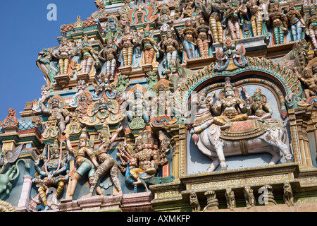 Carved figures on a gopuram, Meenakshi Temple, Madurai, Tamil Nadu, India Stock Photo