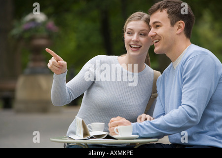 Couple having coffee at outdoor café Stock Photo