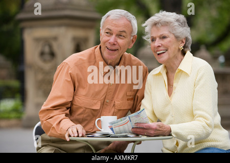 Senior couple having coffee at outdoor café Stock Photo
