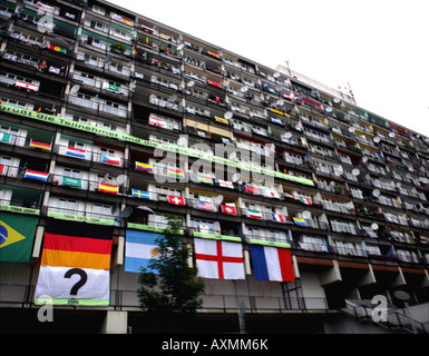 a council estate decorated with flags on the Potsdamer Str. in Berlin Stock Photo