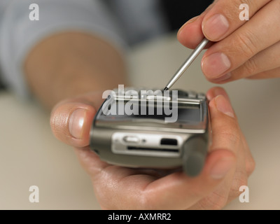Man using PDA Stock Photo