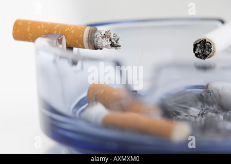 Closeup of cigarettes in ashtray Stock Photo