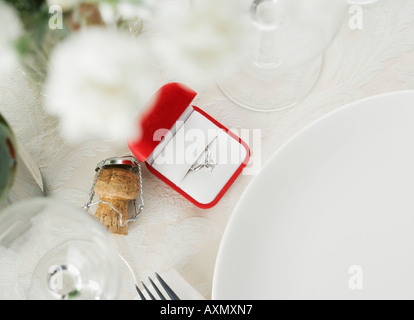 Still life of table setting and engagement ring Stock Photo