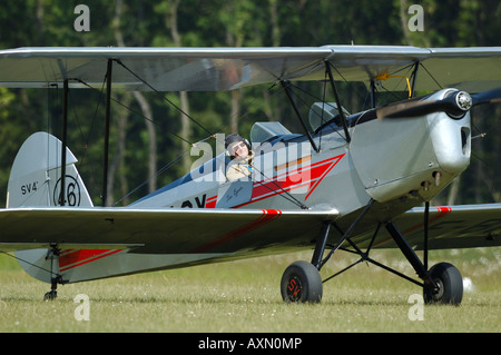 Old french trainer biplane Stampe SV-4a, french vintage air show, La Ferte Alais, France Stock Photo