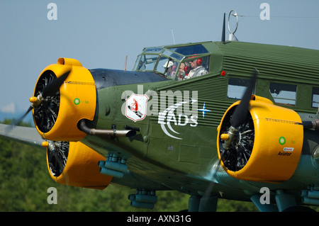 Old German cargo and transport plane Junkers Ju-52, french vintage air show at La Ferte Alais, France Stock Photo