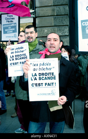 Paris France, French Gay Activists from 'Pink Panthers' Organization Protesting lgbt against homophobia, Holding Protest Signs Stock Photo