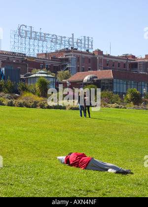 Homeless man in Ghirardelli Square, San Francisco CA Stock Photo