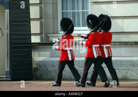 Foot Guards in front of Buckingham Palace, Official Residence of Queen Elizabeth II in London, UK Stock Photo