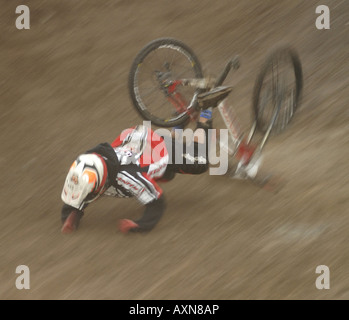 RIDER CRASHES DURING THE FOUR CROSS MOUNTAIN BIKE WORLD CUP SERIES IN FORT WILLIAM Stock Photo