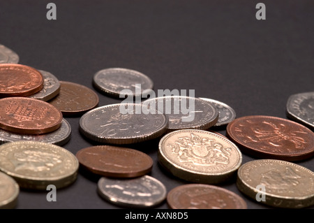coins pounds pocket money spend pay UK GB England English currency Stock Photo