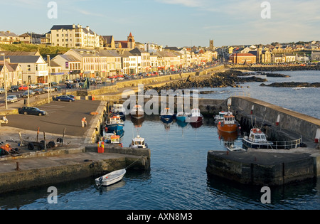 Portstewart fishing boat harbour and main street seafront, County Derry. 3 miles from Coleraine and Portrush, Northern Ireland. Stock Photo