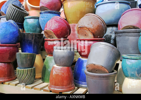 Multicoloured glazed garden pots, garden centre near Kilmarnock, Scotland Stock Photo