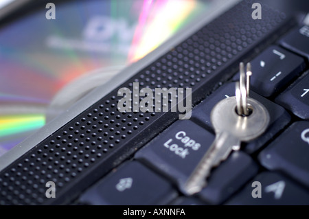 Key by Caps lock button on laptop keyboard security digital risk management Stock Photo