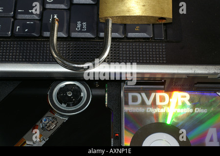 DVD reader unit optical reader for Digital video or audio disc with padlock Stock Photo