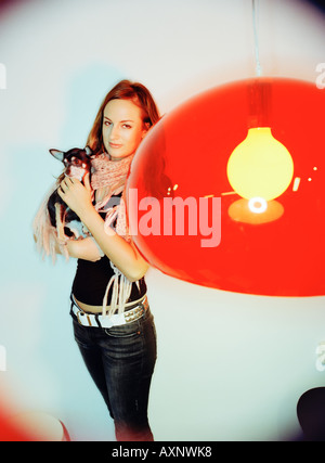 portrait off a young woman and her little dog Stock Photo