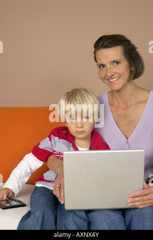 Mother and son (4-5 Years) using a laptop Stock Photo