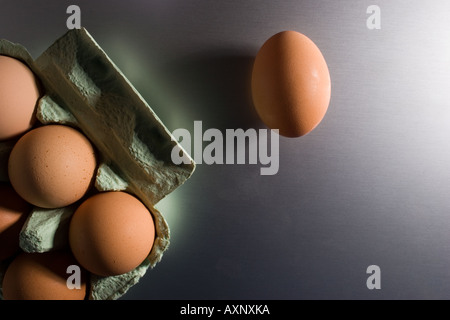 Eggs in a box in a kitchen. Stock Photo