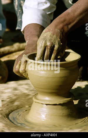 India Rajasthan crafts Khuri pot being formed on wheel detail Stock Photo