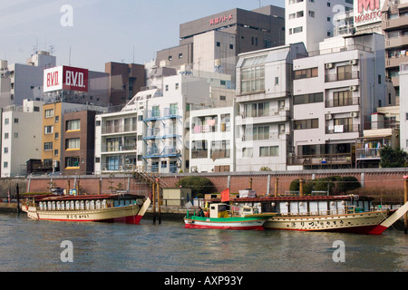 Restaurant boats on the Sumida River in Asakusa district of Tokyo Japan Stock Photo