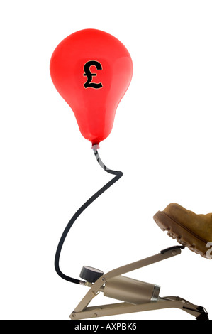 red balloon with pound sterling symbol inflated by a footpump Stock Photo